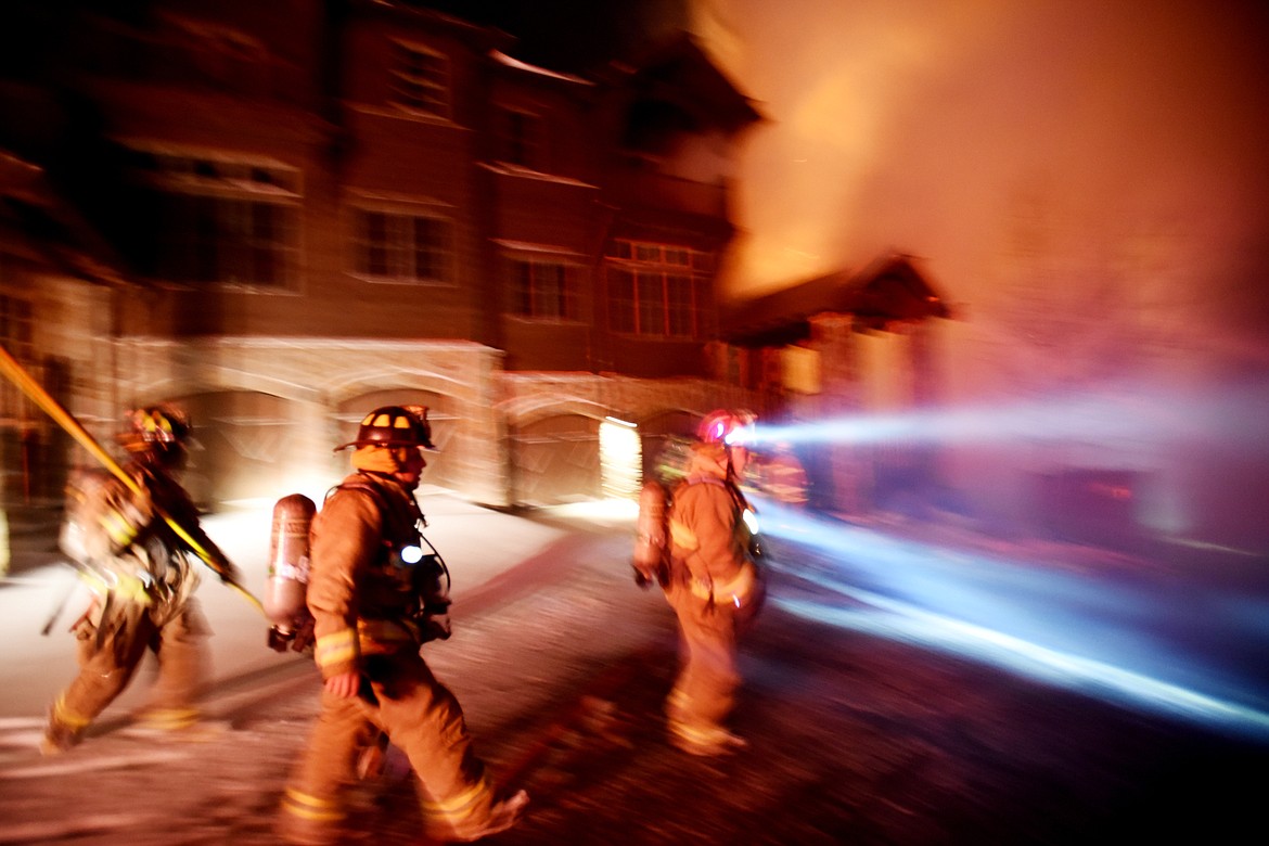 Firefighters from Whitefish Fire, Kalispell Fire, Evergreen Fire and Rescue and Columbia Falls Fire joined the team from Big Mountain Fire and Rescue to fight the massive fire on Slopeside Drive on Thursday night, November 2.