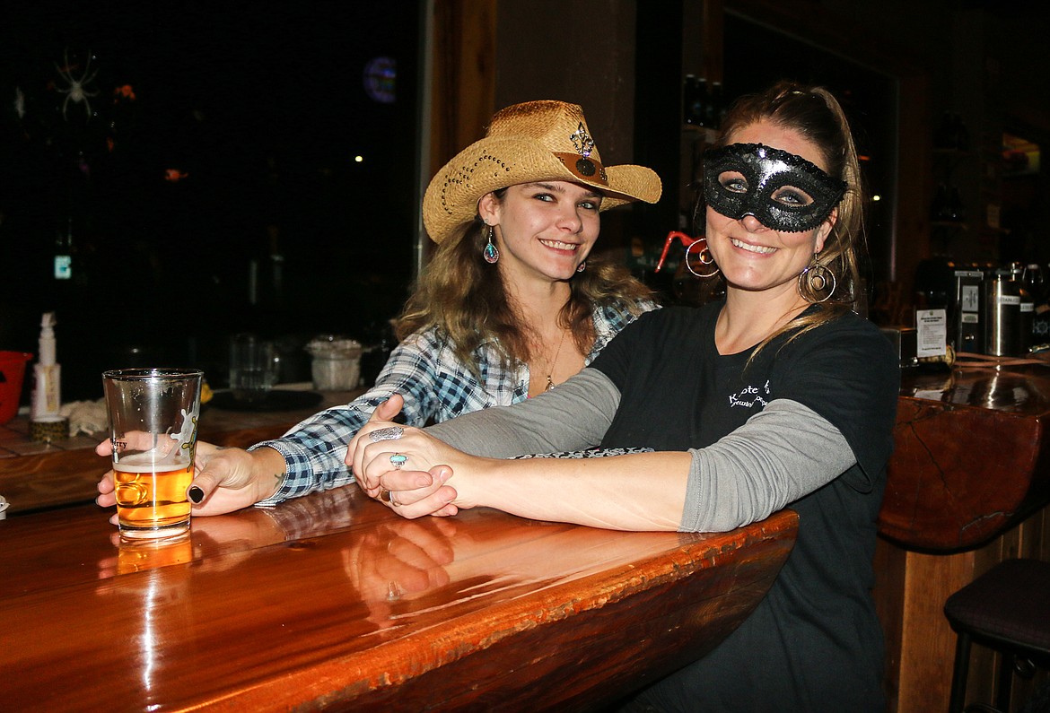 Photo by Mandi Bateman
Assistant manager Kimberly Helsper and server Summer Peterson kept the Halloween spirit going during the Kootenai River Brewing Company&#146;s Halloween party.