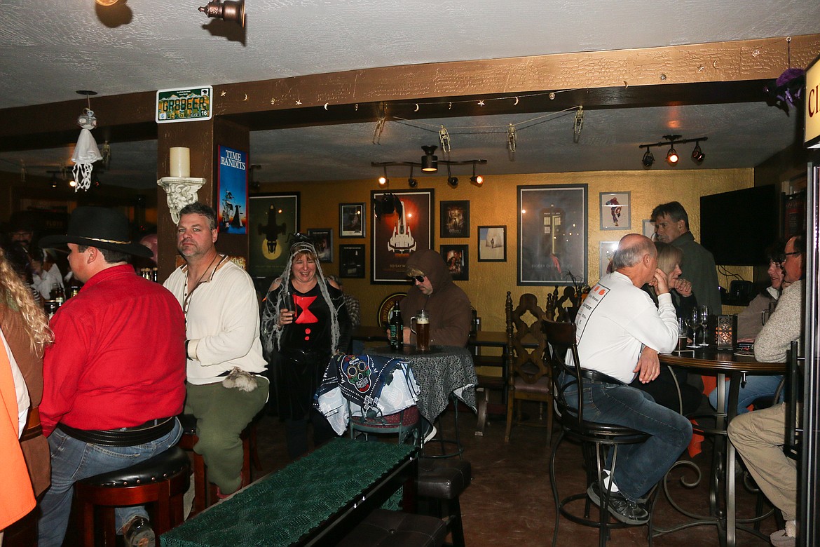 Photo by Mandi Bateman
The cozy, well decorated atmosphere of Heartrock Wines/Crosstime Saloon&#146;s Halloween party had customers laughing and having a good time.