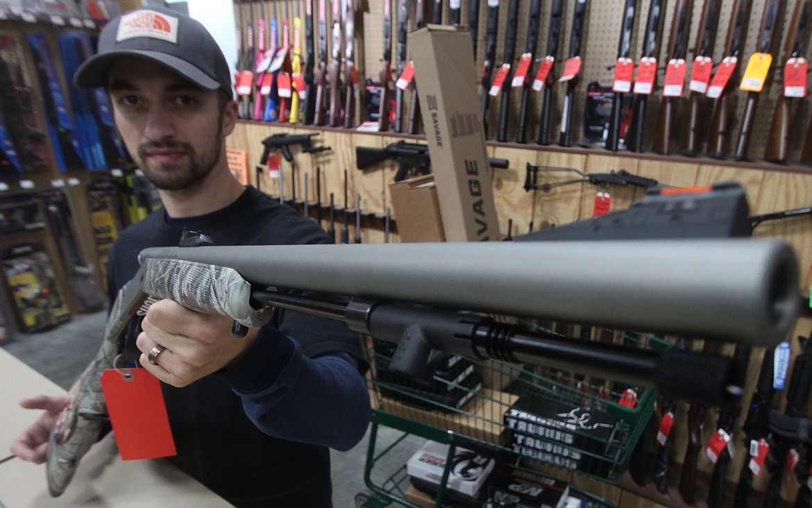 RALPH BARTHOLDT/Press
Brandon Kron of Black Sheep displays a .50-caliber muzzleloader, the kind legal to use in muzzleloader elk hunts in Idaho. Muzzleloader hunts for elk begin this month for Idaho A-tag hunters.