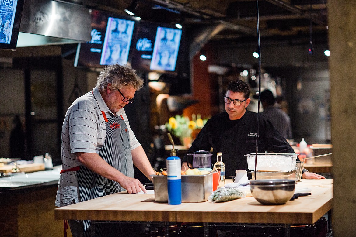 (Photo courtesy WILDWOOD GRILLING)
Wildwood Grilling's Matt Curmi, right, recently teamed up with Pacific Northwest chef Tom Douglas to host the &#147;Glorious Wood Planked and Smoked Pacific Northwest Dinner&#148; at the Hot Stove Society in Seattle.