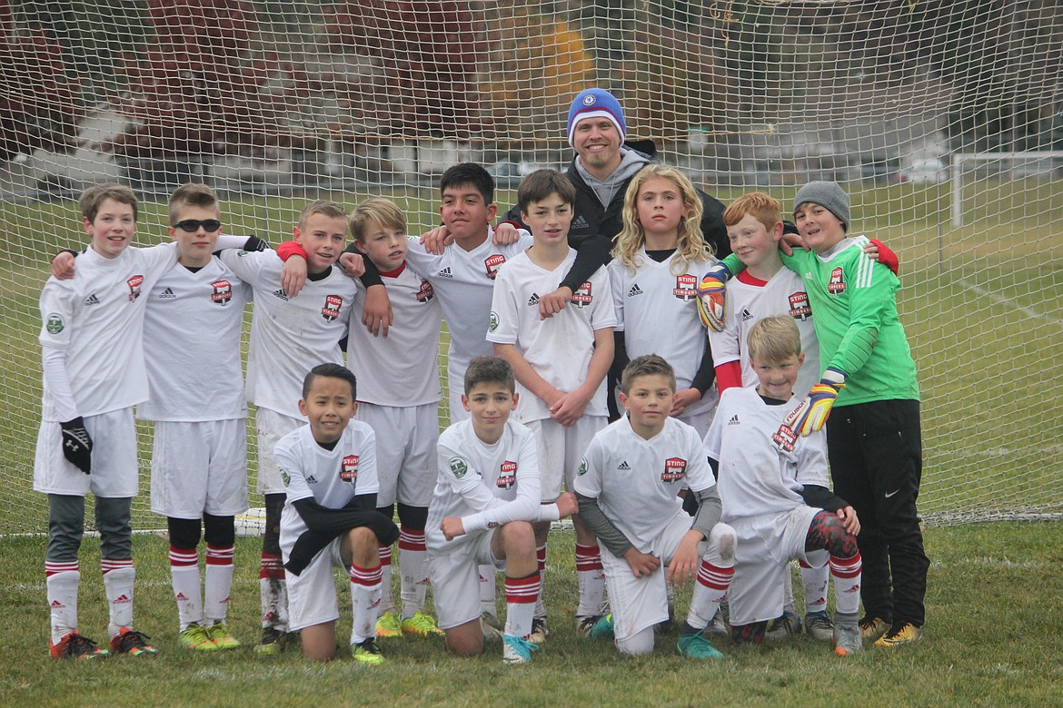 Courtesy photo
The Sting Timbers FC &#145;05 boys white soccer team finished its fall season battling the United SC Sounders from Omak to a 2-2 tie on Saturday at Canfield Middle School. Scoring for Sting Timbers FC were Jaron Voeller and Boston Spear. In the front row from left are Jayden Pham, Ari Rumpler, Brayden Ristic and Boston Spear; and back row from left, Cameron Childers, Quinlan Schreiber, Jaron Voeller, Landon Sternberg, Sebastian Baker, Charlie Pinto, coach Landon Anderson, Trenton Anderson, Gavin Schoener and Bryant Donovan. Not pictured is Stetson Gilbert.