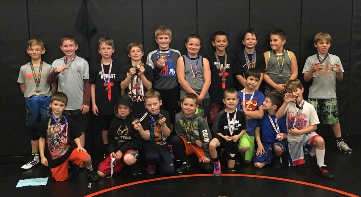 Courtesy photo
Team Real Life wrestlers competed in the second tournament of the North Idaho Wrestling League series in Kellogg on Oct. 28. In the front row from left are Jacob Kunzi, 1st; Lennox Nilson, 3rd; Tyson Pulczinski, 2nd; Colin Davis, 1st; Jaxon Brazle; Michael Stewart; Lachann Nilson, 2nd; and Matthew Hamilton, 1st; and back row from left, Rider Seguine, 1st; Noah Shore, 3rd; Hunter Chambers, 3rd; Jacob Aurora, 1st; Breckin Jolley, 3rd; Briley Arnett; Benjamin Carrasco, 1st, Byson Huber, 1st; Coleton Austin, 1st; and Damion Hamilton, 1st. Also placing but not pictured: Alex Austin, 1st; Gavin Winter, 1st; Justin Donnell, 2nd; Lincoln Deese, 2nd; and Seth Martin, 3rd.