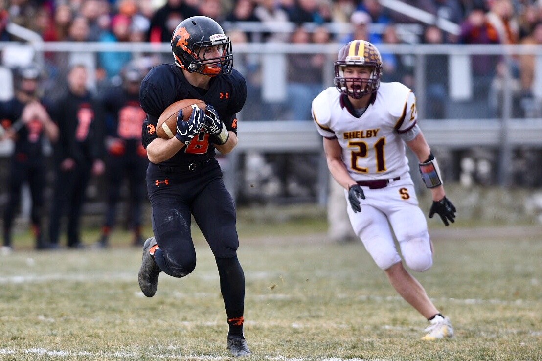 Eureka&#146;s Brenton Pluid hauls in a touchdown reception for the Lions first score of the game in the first quarter against Shelby. (Casey Kreider photo/Daily Inter Lake)