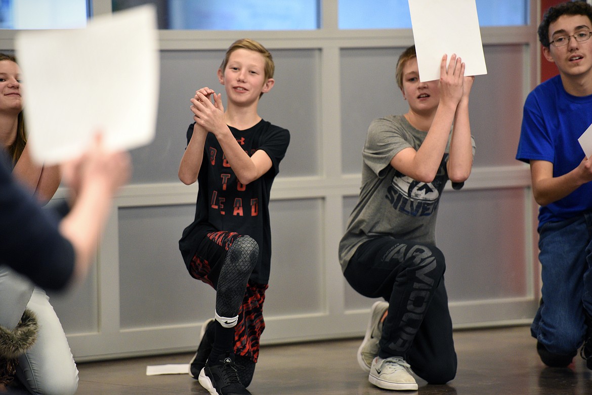 West Valley School student Carter VanHelden gestures while reciting a line from Shakespeare&#146;s &#147;Twelfth Night&#148; during a language workshop with Montana Shakespeare in the Schools on Tuesday. (Casey Kreider/Daily Inter Lake)