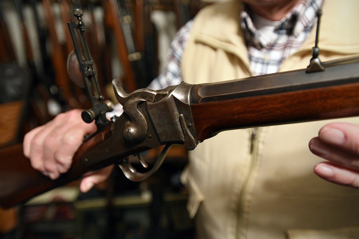 Jack Paulson holds a Sharps 1874 rifle, one of a collection of antique guns he&#146;s donating to the Montana Historical Society.