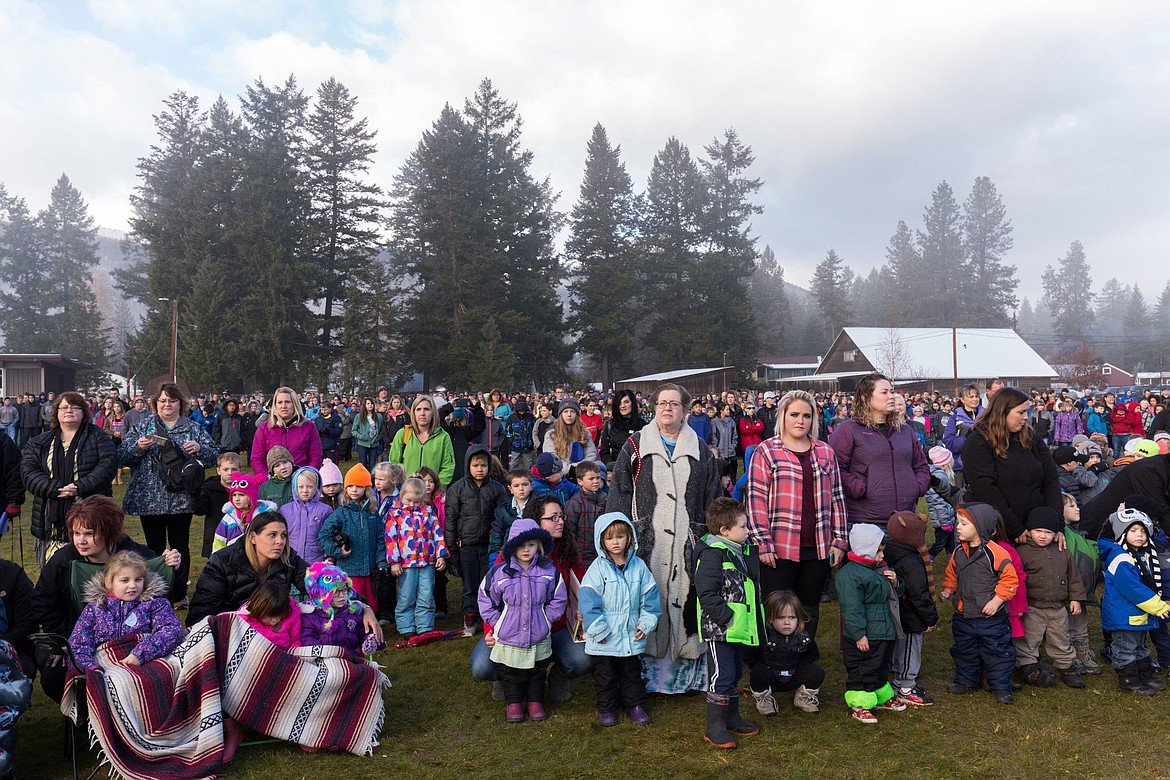 Hundreds of people, including local government and Forest Service officials, gathered on the Libby High School practice field Tuesday to give a big send off to the Capitol Christmas Tree. (John Blodgett/The Western News)