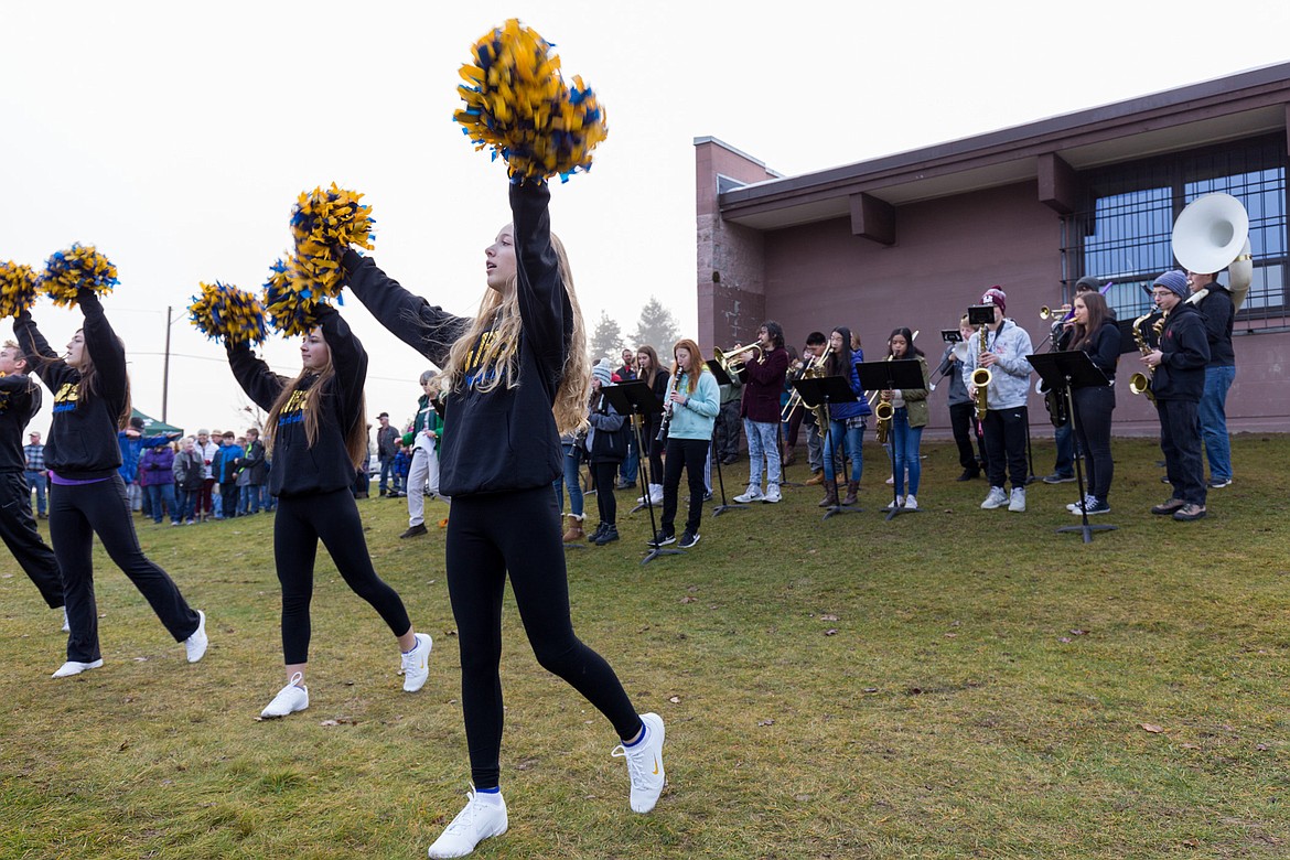 Libby High School cheerleaders and band members participate in Tuesday&#146;s festivities on the high school practice field. (John Blodgett/The Western News)