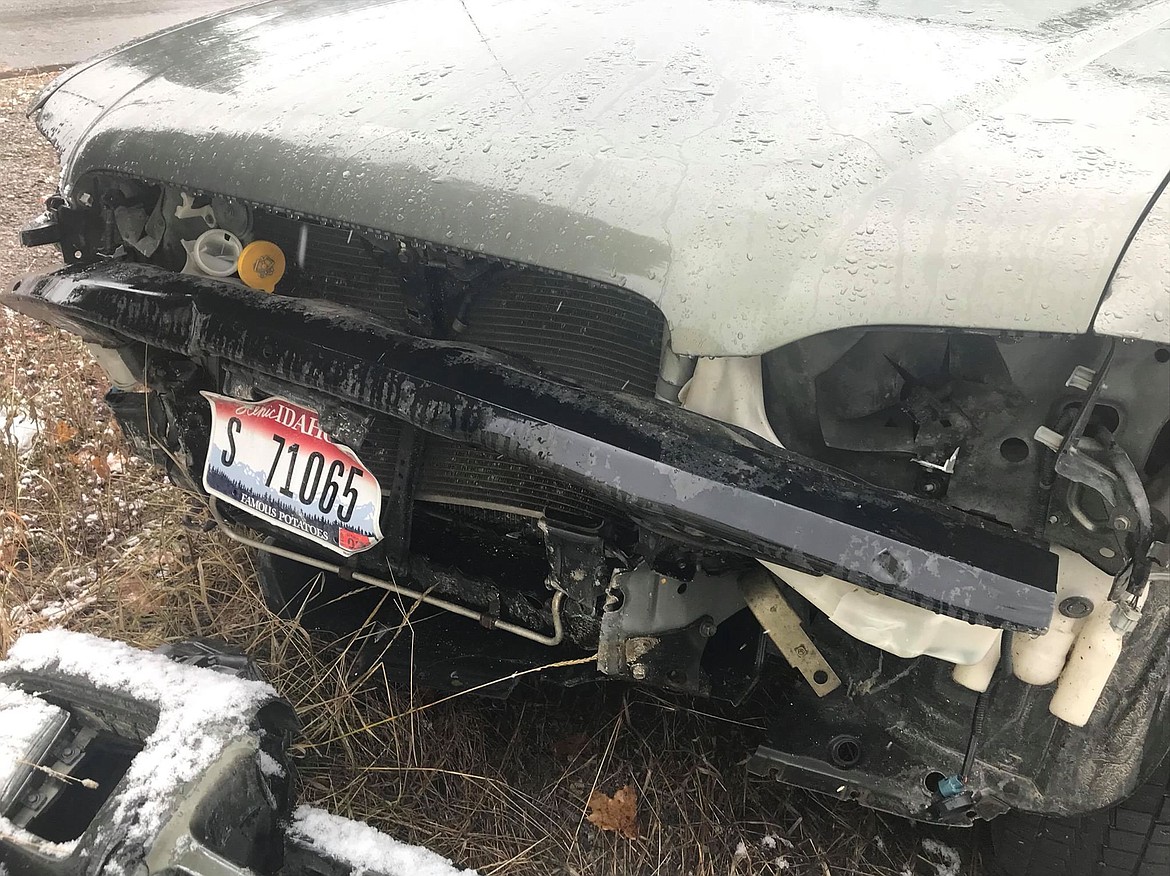 The front end of Austin McKinnon&#146;s wrecked Nissan Pathfinder following his collision with a guard rail on Nov. 10. Becuase of the seat belt challenge, both McKinnon and his passenger, Isaiah Webb, walked away from the incident with only cuts and bruises.