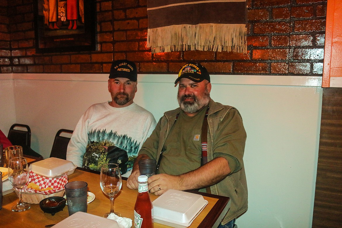 Photo by Mandi Bateman
Coast Guard Veteran Bill Svec and U.S. Army Veteran Gary Britton enjoy a dinner at Mi Pueblo, provided by Coldwell Banker North Woods Realty, who paid for the first 100 meals for veterans on November 11 at the restaurant.