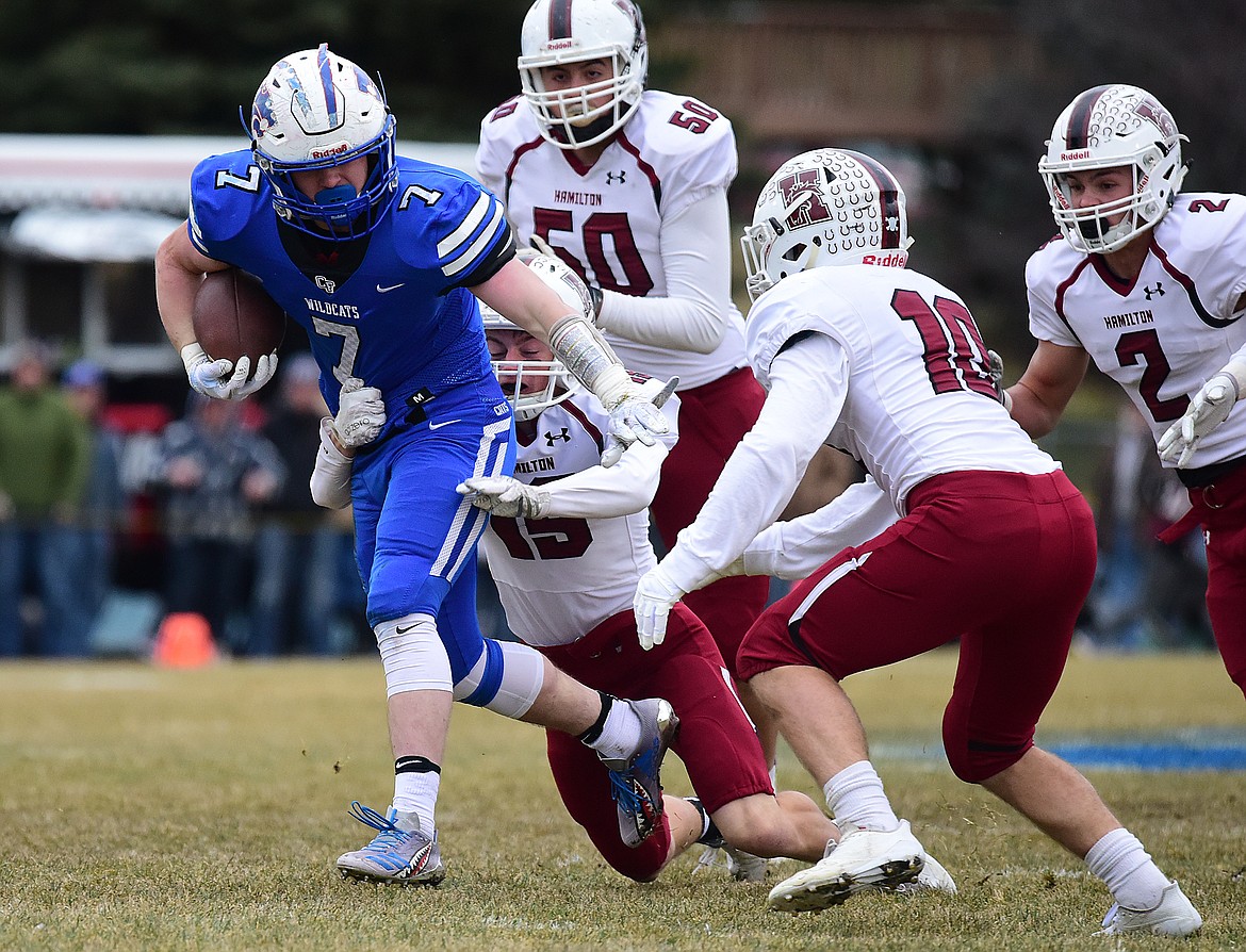 Colten McPhee breaks a tackle.