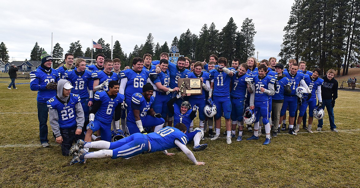 Austin Green leaps into the team picture.