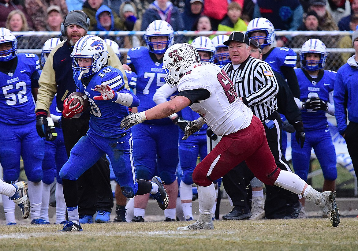 Logan Bechtel sprints for extra yards.