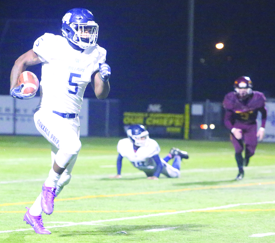 Connor Vanderweyst/Columbia Basin Herald
University of Washington commit Devin Culp runs with the ball against Moses Lake.