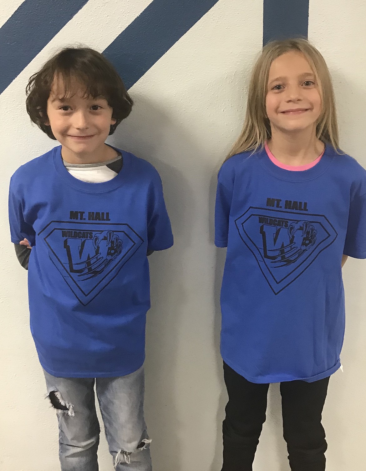 Mt. Hall Elementary School students model the new T-shirts.