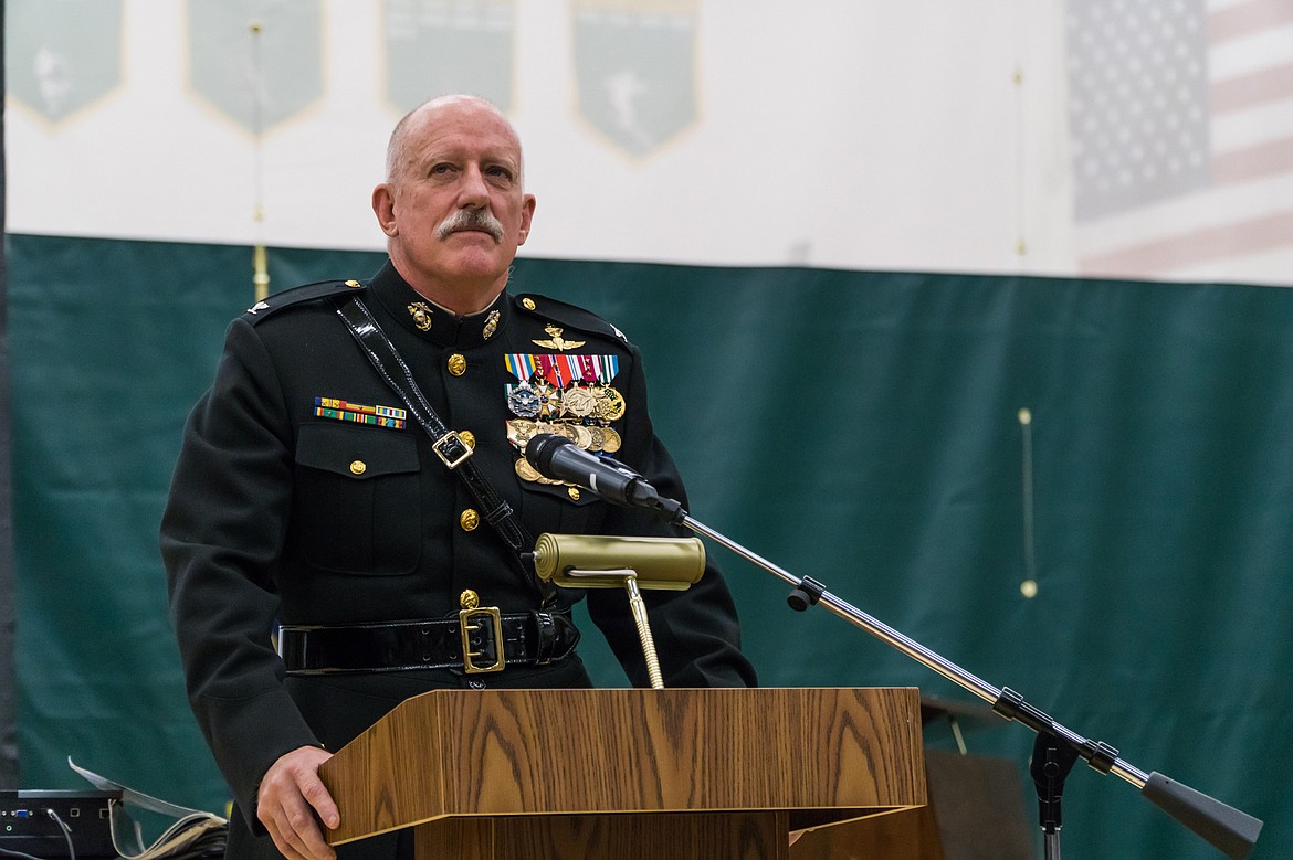 Col. George H. Bristol pauses while addressing the crowd during Friday&#146;s Veterans Day celebration at Whitefish High School. (Daniel McKay photos/Whitefish Pilot)