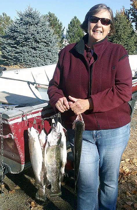 Pete Fisher photo - Jackie Oakland caught these nice rainbow trout fishing on Medicare Beach from her lawn chair. She only fished for an hour and a half.