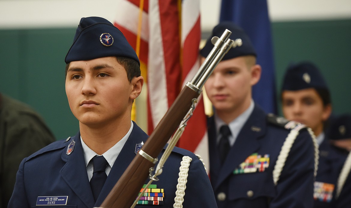 Civil Air Patrol United States Air Force Auxiliary Cadet Chief Master Sergeant Trey Siers and the color guard conduct the Presentation of Colors at the Veterans Day Community Event at Whitefish High School on Friday, November 10.(Brenda Ahearn/Daily Inter Lake)