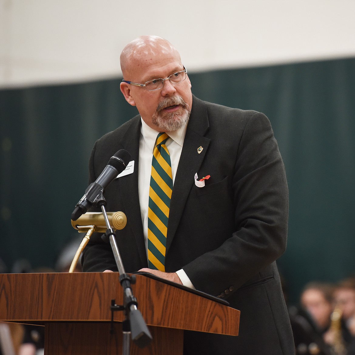 Principal Kerry Drown making opening remarks during the Veterans Day Community Event at Whitefish High School on Friday, November 10. Drown reminded students that Veterans Day is an opportunity to reflect, to recognize and to how respect and appreciation for all those who served.(Brenda Ahearn/Daily Inter Lake)
