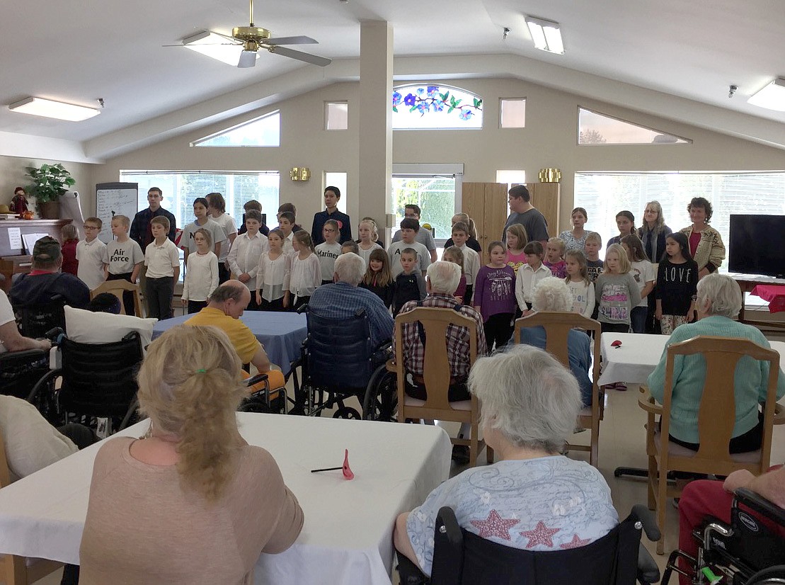 Kootenai Valley Christian School performs segments of its Veterans Day Program for the residents of the Libby Care Center on Monday, Nov. 6. (Courtesy photo) 