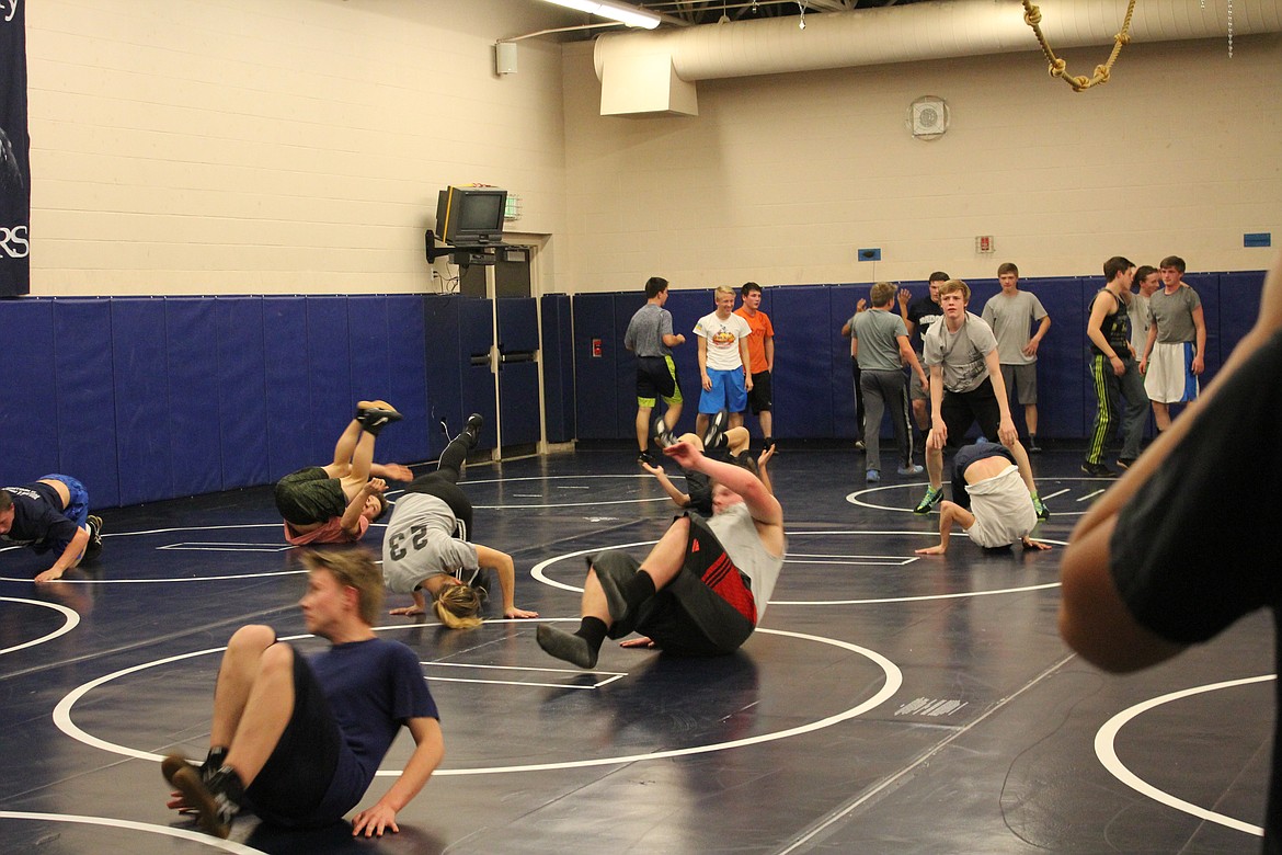 Photo by Tanna Yeoumans
Wrestlers use tumbling excercises to train for matches.