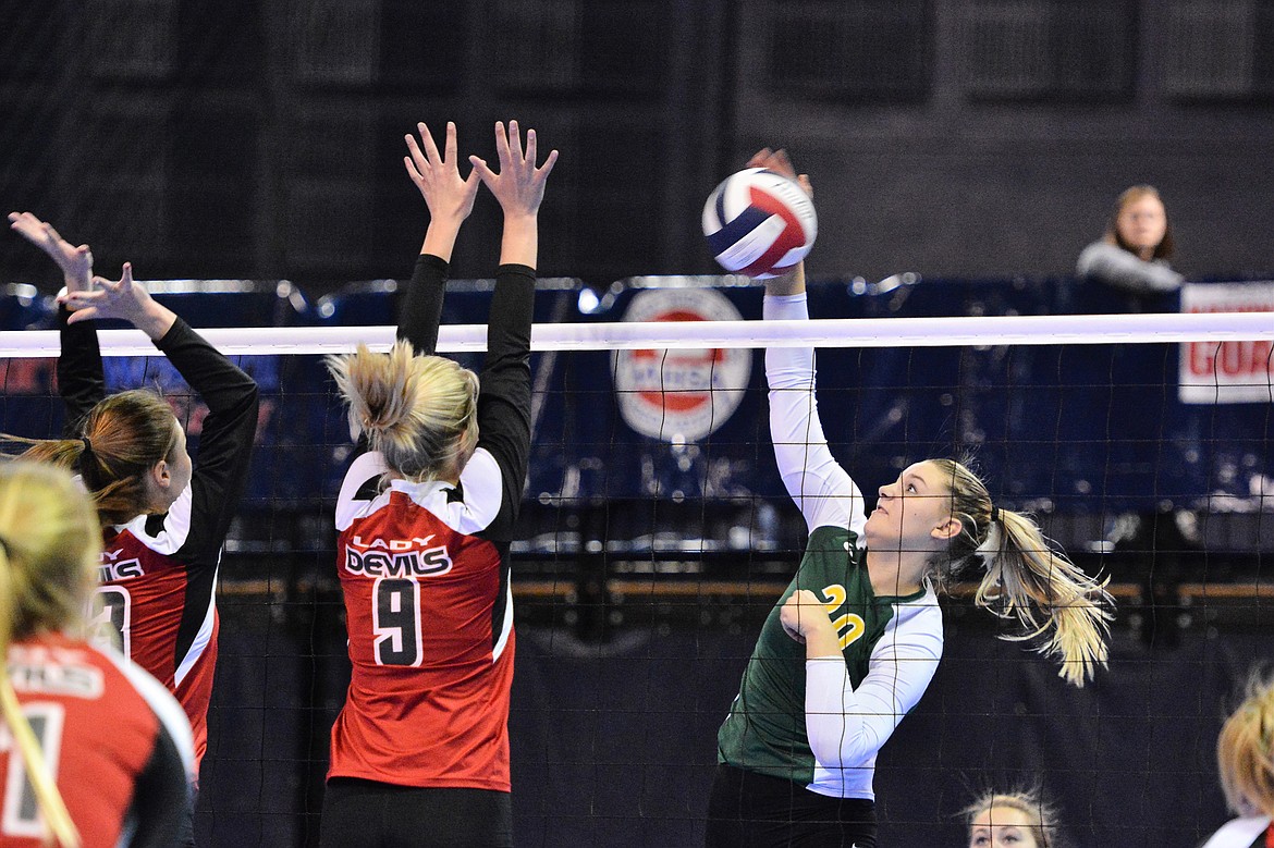 Cailyn Ross nails the ball at the net during the Class A State Tournament last week at the Brick Breeden Fieldhouse in Bozeman. (Photos courtesy Jeff Doorn)