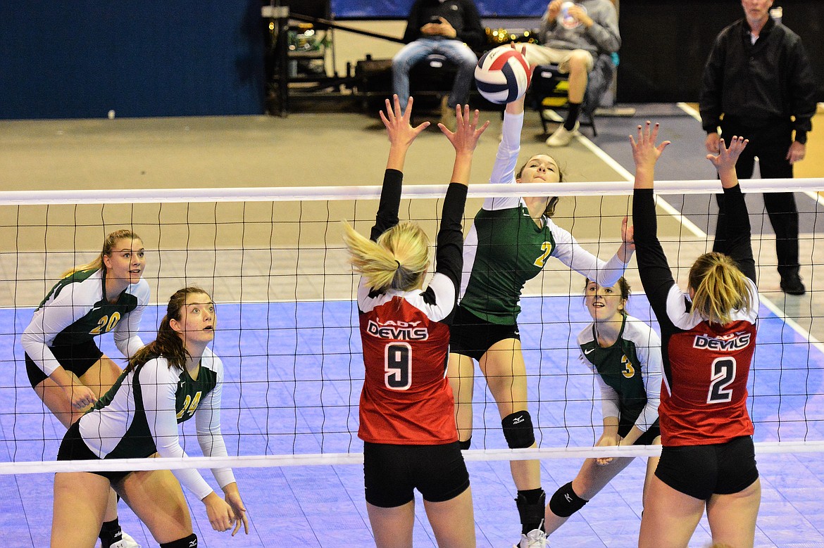 Lauren Schulz rises high for the spike during the Class A State Tournament.