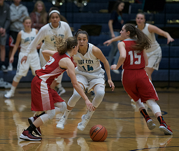 MARK NELKE/Press
Lake City junior guard Dejah Wilson defends against Sandpoint.