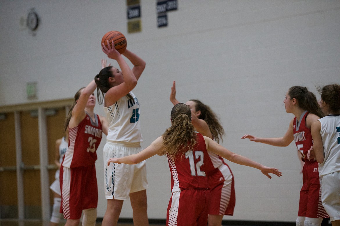 MARK NELKE/Press
Lake City High freshman post Brooklyn Rewers goes up for a shot in traffic vs. Sandpoint last Tuesday.