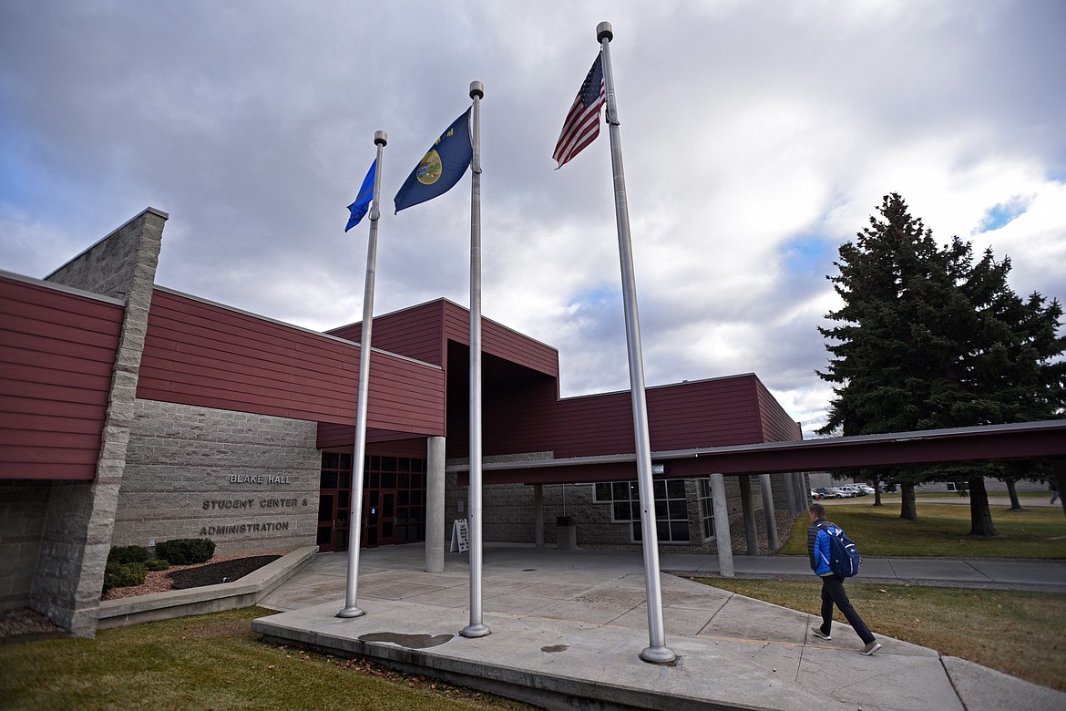 A student walks outside the Blake Hall Student Center &amp; Administration building at Flathead Valley Community College in Kalispell on Wednesday, Nov. 29. (Casey Kreider/Daily Inter Lake)