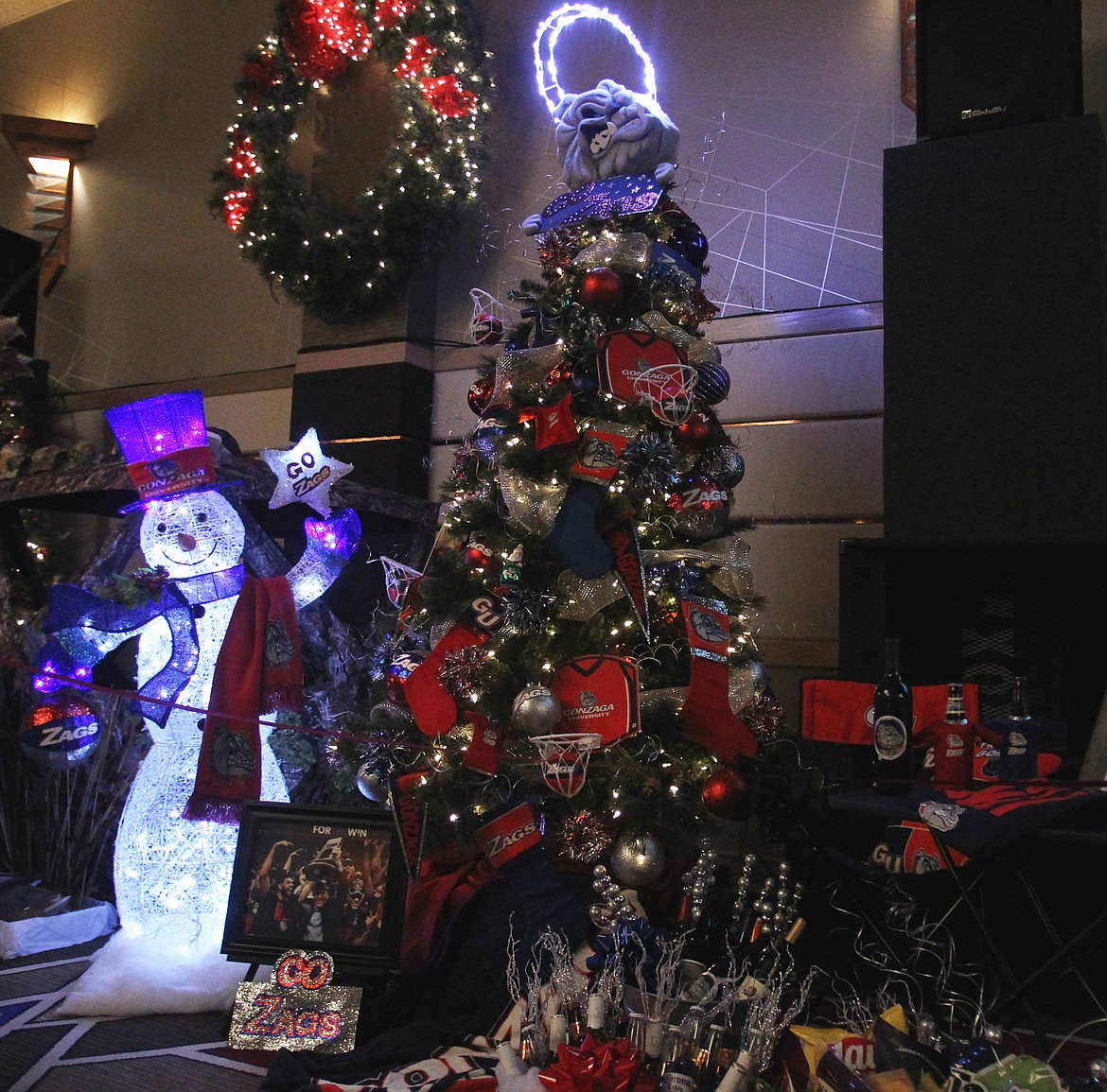 &quot;Go Zags, Go!&quot; by Hart Capital Management: This brightly lit Gonzaga Bulldog fandom tree includes five tickets to the men's basketball game against Santa Clara on Dec. 30 and two tickets to the women's game on Jan. 13 against San Francisco. (DEVIN WEEKS/Press)