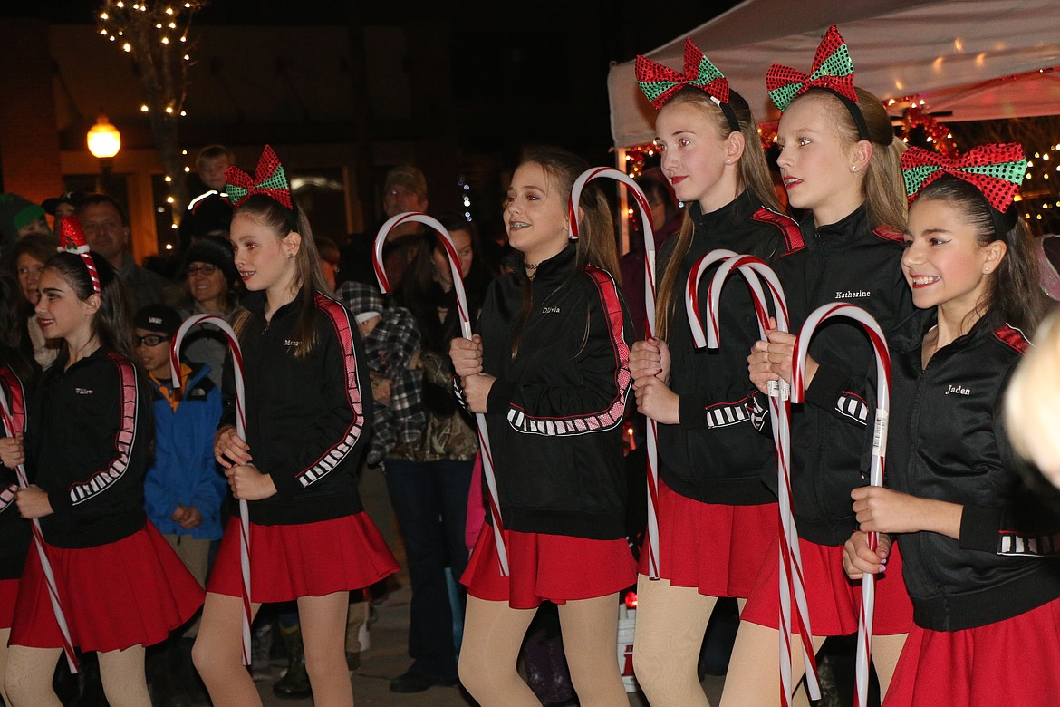 (Photo by CAROLINE LOBSINGER)
Allegro Dance Studio dancers perform a routine at Friday's Christmas tree lighting ceremony at Jeff Jones Town Square.