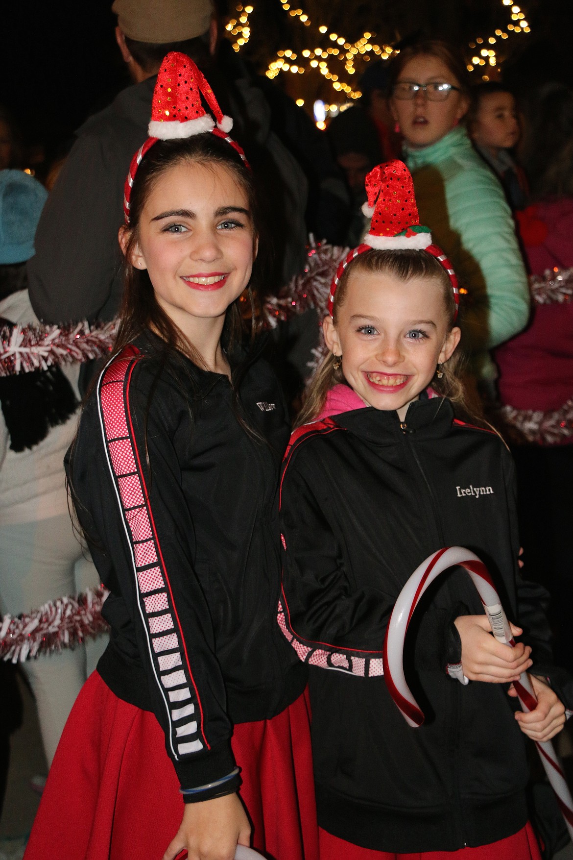 (Photo by CAROLINE LOBSINGER)
A pair of Allegro Dance Studio dancers strike a pose after performing at Friday's Christmas tree lighting ceremony at Jeff Jones Town Square.