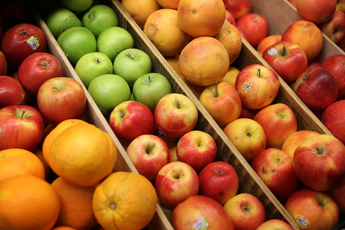 Apples and oranges fill a display case inside Camas Organic Market and Bakery in Hot Springs. (Mackenzie Reiss/Daily Inter Lake)