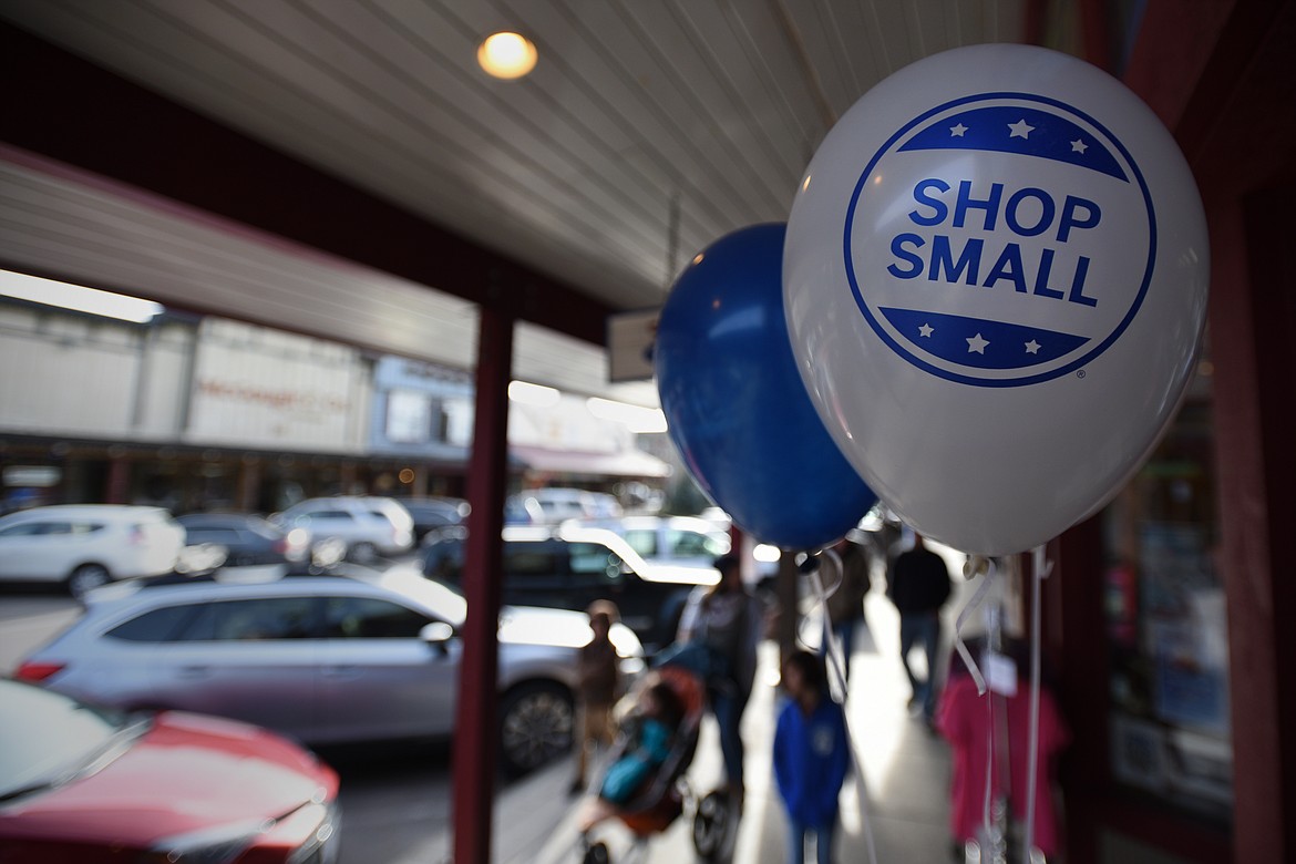 Shoppers walk along Central Avenue in Whitefish during a Small Business Saturday event on Nov. 25. (Casey Kreider/Daily Inter Lake)