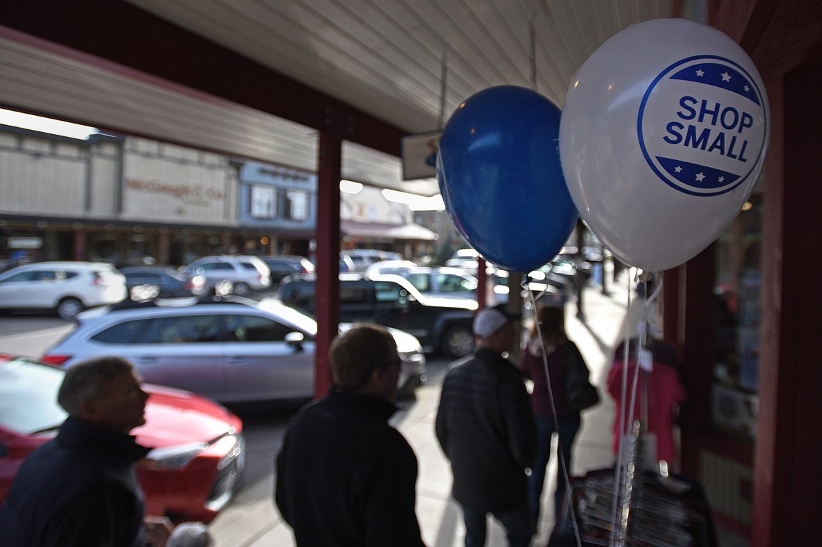 Shoppers walk along Central Avenue in Whitefish during a Small Business Saturday event on Nov. 25. (Casey Kreider/Daily Inter Lake)