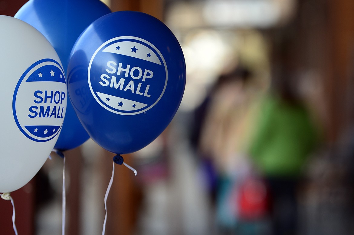 Shoppers walk along Central Avenue in Whitefish during a Small Business Saturday event on Nov. 25. (Casey Kreider/Daily Inter Lake)