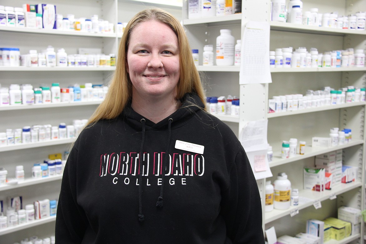 Photo by TOM GREENE/North Idaho College
Kris Peterson at her job as the pharmacy technician at White Cross Pharmacy in Spirit Lake. Peterson hit the ground running after graduating from North Idaho College Pharmacy Technician program earlier this year.