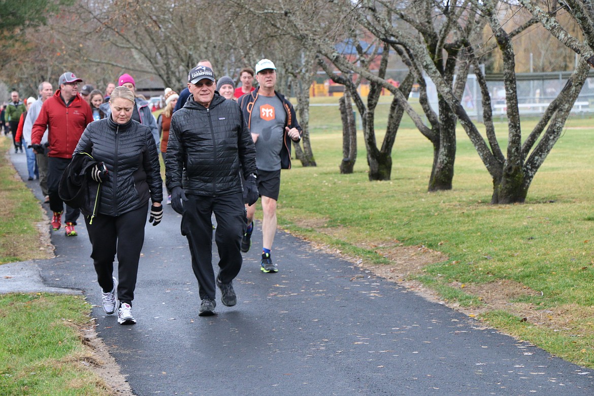 (Photo by CAROLINE LOBSINGER)
Turkey Trot participants make their way around Travers Park as they take part in the 10th annual Turkey Trot on Thanksgiving Day. The event, which is sponsored by Sandpoint Parks &amp; Recreation and Sandpoint West Athletic Club, raises donations and food for the Bonner Community Food Bank.
