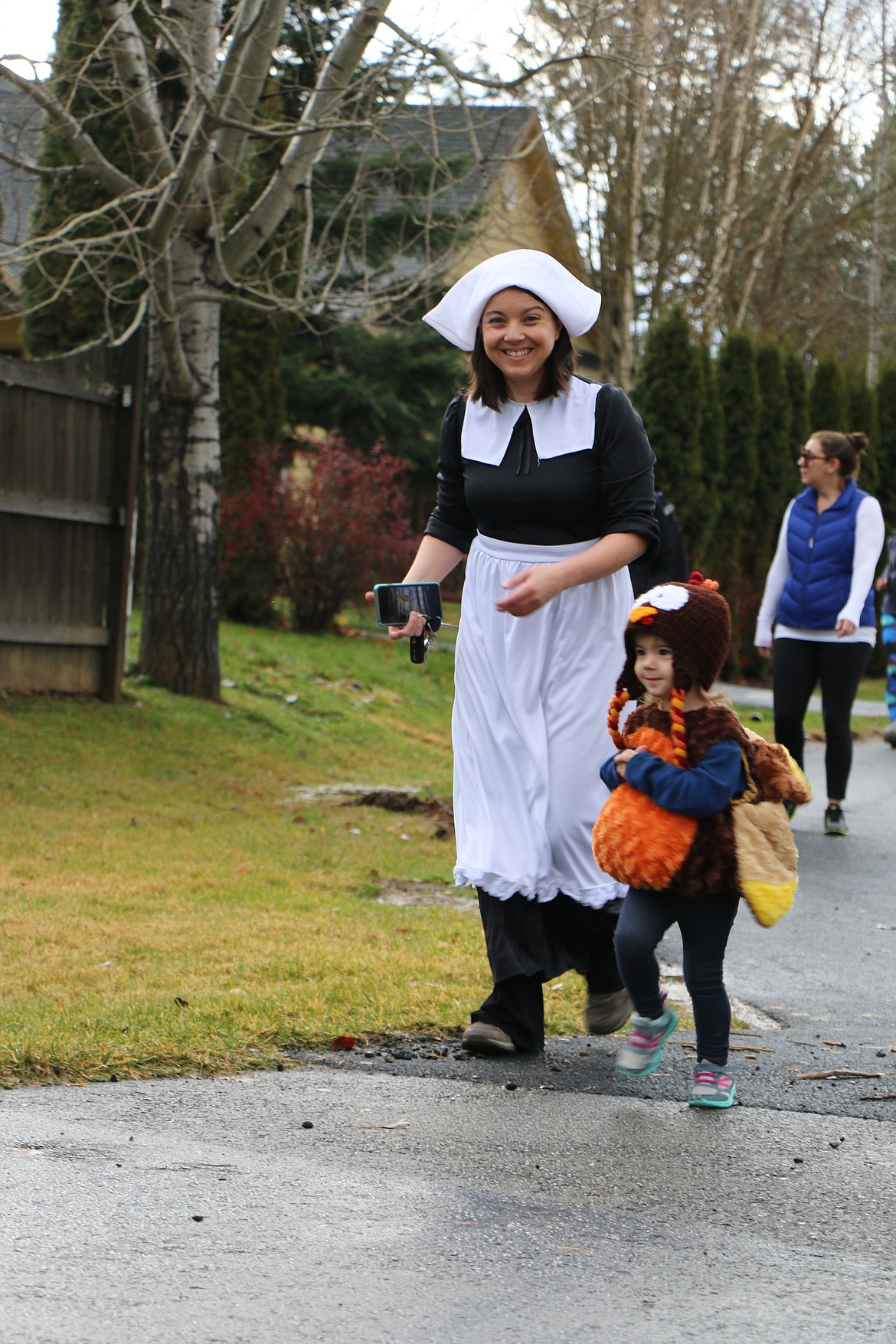 (Photo by CAROLINE LOBSINGER)
A pair of Turkey Trot participants came dressed for the event as they take part in the 10th annual Turkey Trot on Thanksgiving Day. The event, which is sponsored by Sandpoint Parks &amp; Recreation and Sandpoint West Athletic Club, raises donations and food for the Bonner Community Food Bank.