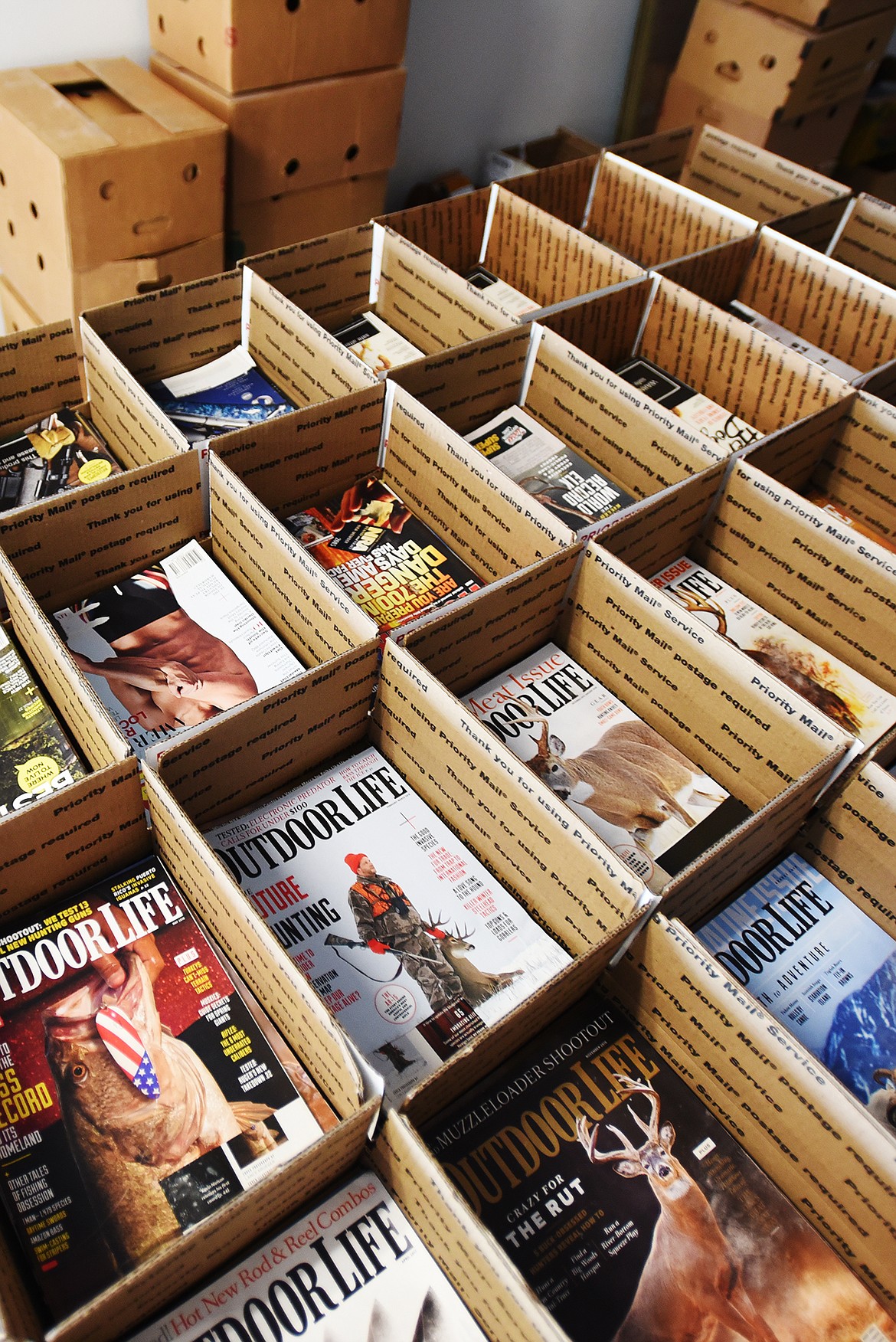 A shipment of magazines going to deployed troops is awaiting final packaging on Tuesday, November 22, at Magazines for Troops in Lakeside.(Brenda Ahearn/Daily Inter Lake)