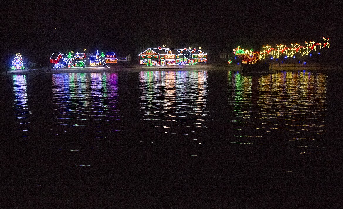 LOREN BENOIT/Press

Various North Pole lights reflect across the waters of Lake Coeur d&#146;Alene.