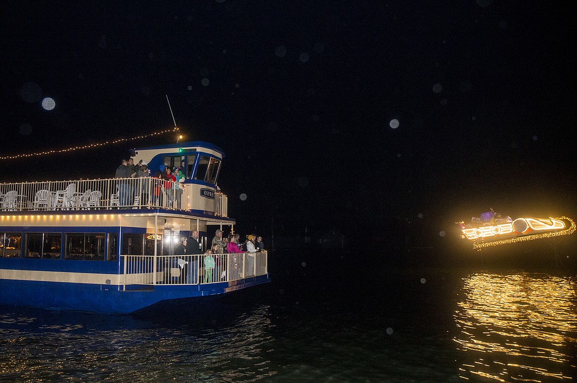 LOREN BENOIT/PressGuests arrive at the North Pole aboard a Coeur d'Alene Resort cruise boat to see Santa.