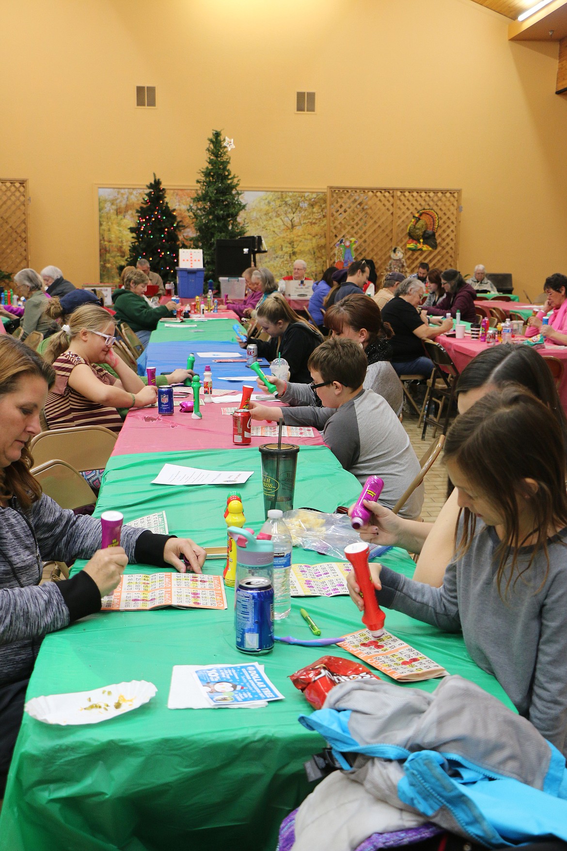 (Photo by CAROLINE LOBSINGER)Bingo players pack the tables at the Bonner Mall during the Sandpoint Lions' annual turkey bingo fundraiser last Saturday.