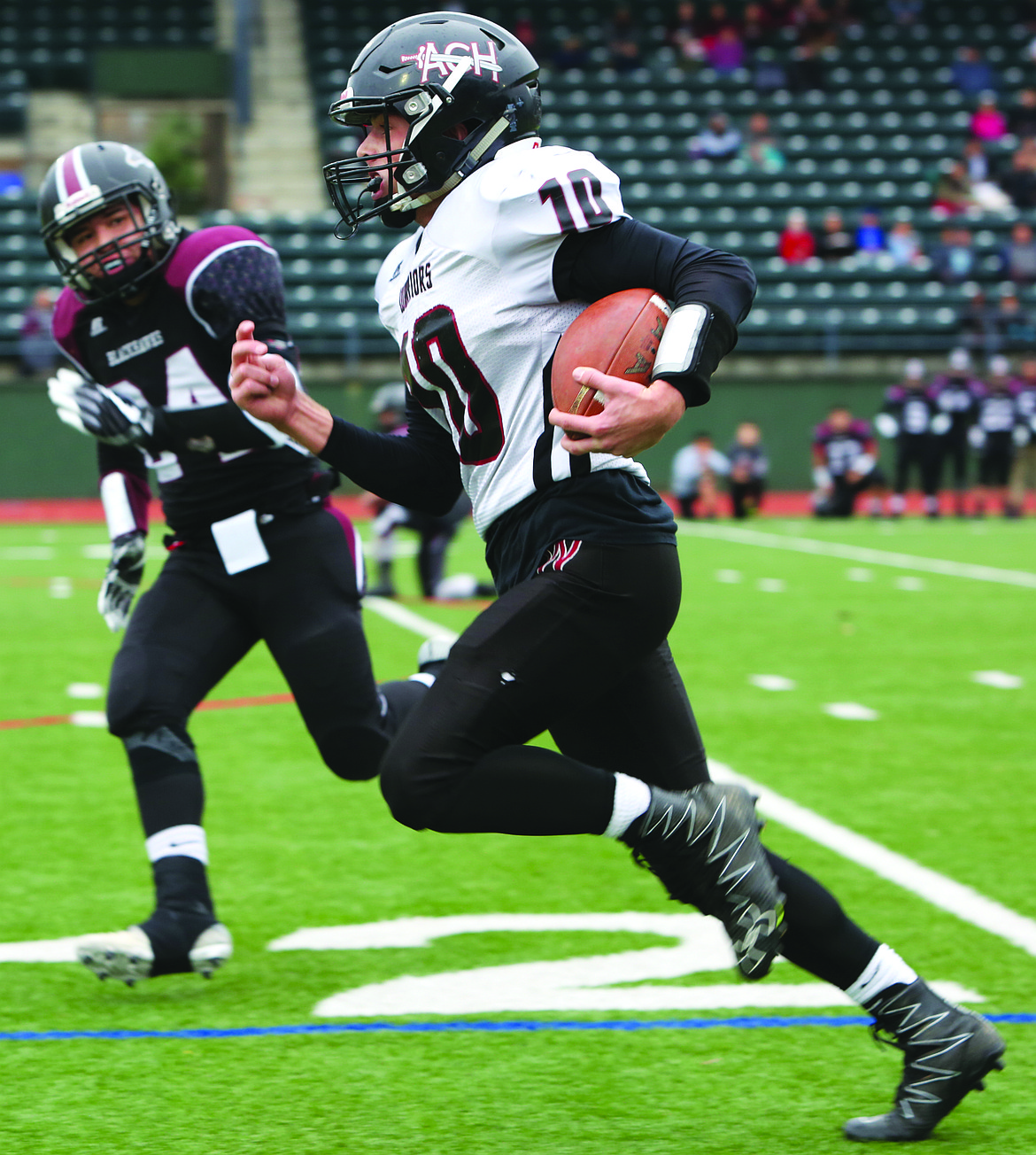 Connor Vanderweyst/Columbia Basin Herald
Almira/Coulee-Hartline's Hayden Loomis turns the corner against Lummi Nation.