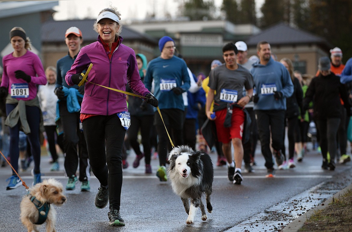 Participants run the Whitefish Turkey Trot on Thursday morning, Nov. 23. (Casey Kreider/Daily Inter Lake)