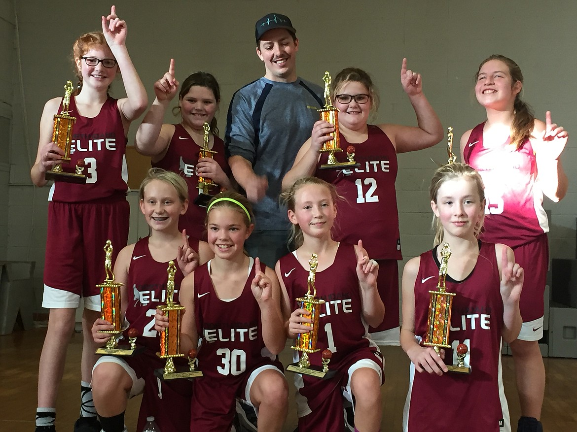 Courtesy photo
The North Idaho Elite-Miller won the fourth- and fifth-grade division of the River City Basketball Tournament in Post Falls last weekend with an overtime victory in the championship game. In the front row from left are Lilly Frades, Rachel Corette, Kaylie Smart and London Lynch; and back row from left, Addison Day, Laythia Warner, Coach Josh Miller, Lanie Carter and Bailey Nipp Berger. Not pictured are Devyn Pirwitz and Lydia Lehosit.