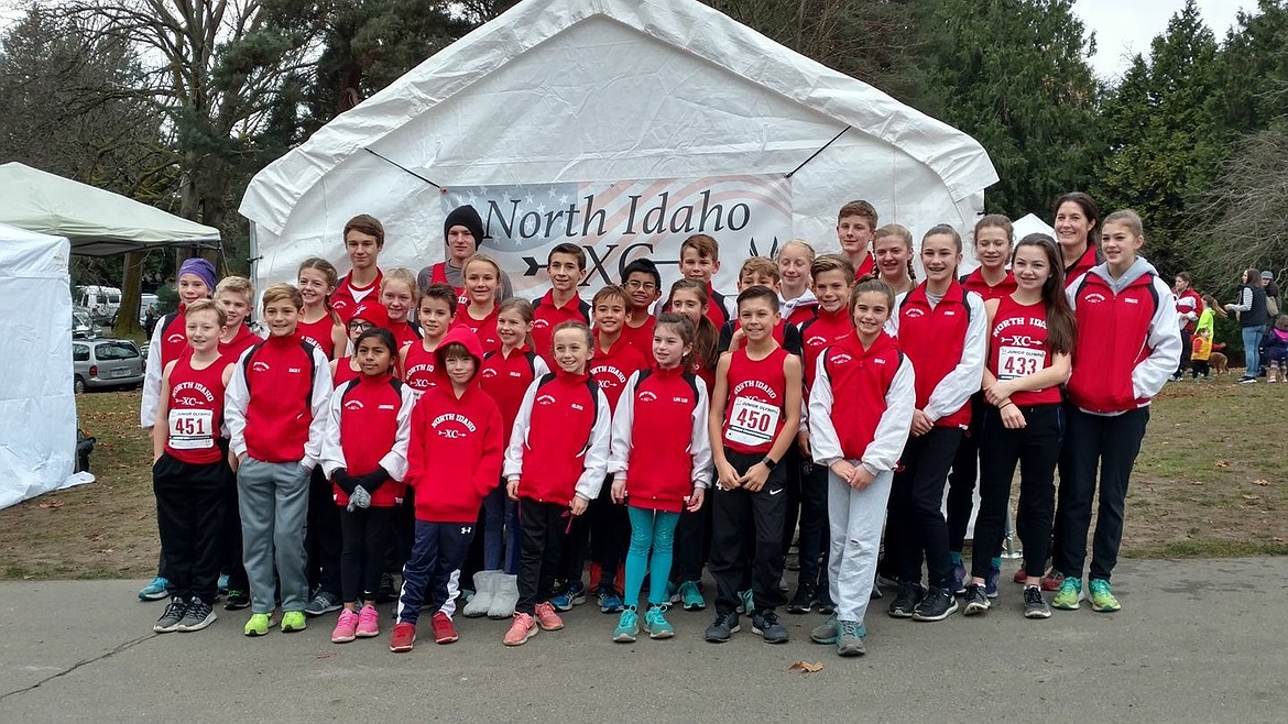 Courtesy photo
The North Idaho Cross Country team competed at the USA Track and Field Junior Olympic Pacific Northwest Championships at Woodland Park in Seattle last Saturday. In the front row from left are Jasmine Gutierrez, Alistair Smith, Olivia May, Olivia Abbey, Ethan Hickok and Neala Hart; second row from left, Alex Jones, Zack Cervi-Skinner, Sam Mandel, Lars Bazler, Helen Oyler, Mitchell Rietze, Zara Munyer, Max Cervi-Skinner, Lachlan May, Fiona Hart and Georgia May; third row from left, Max Anderson, Jenny Elliott, Emersen Duncan, Ara Clark, Max Bazler, Jesus Gutierrez Jr., Spencer Clark III, Lauren Forster, Dorothy Gallus, Lilian Smith and Gracie Averill; and back row from left, Devyn Pirwitz, Carter Gordon, Richard Abbey, Braden Dance and coach Erin Lydon Hart. Not pictured is Elizabeth Smythe.