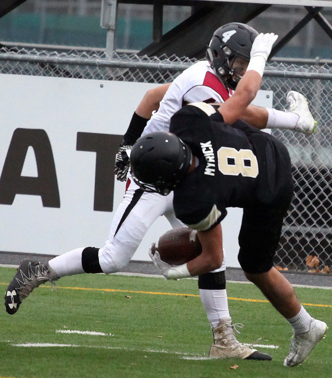 Rodney Harwood/Columbia Basin Herald
Royal running back Lorenzo Myrick (8) is upended after a long pass during the third quarter. Myrick scored two touchdowns in the second half and the Knights punched their ticket to the Tacoma Dome with a 35-7 victory over Newport in the 1A semifinals at Lions Field.