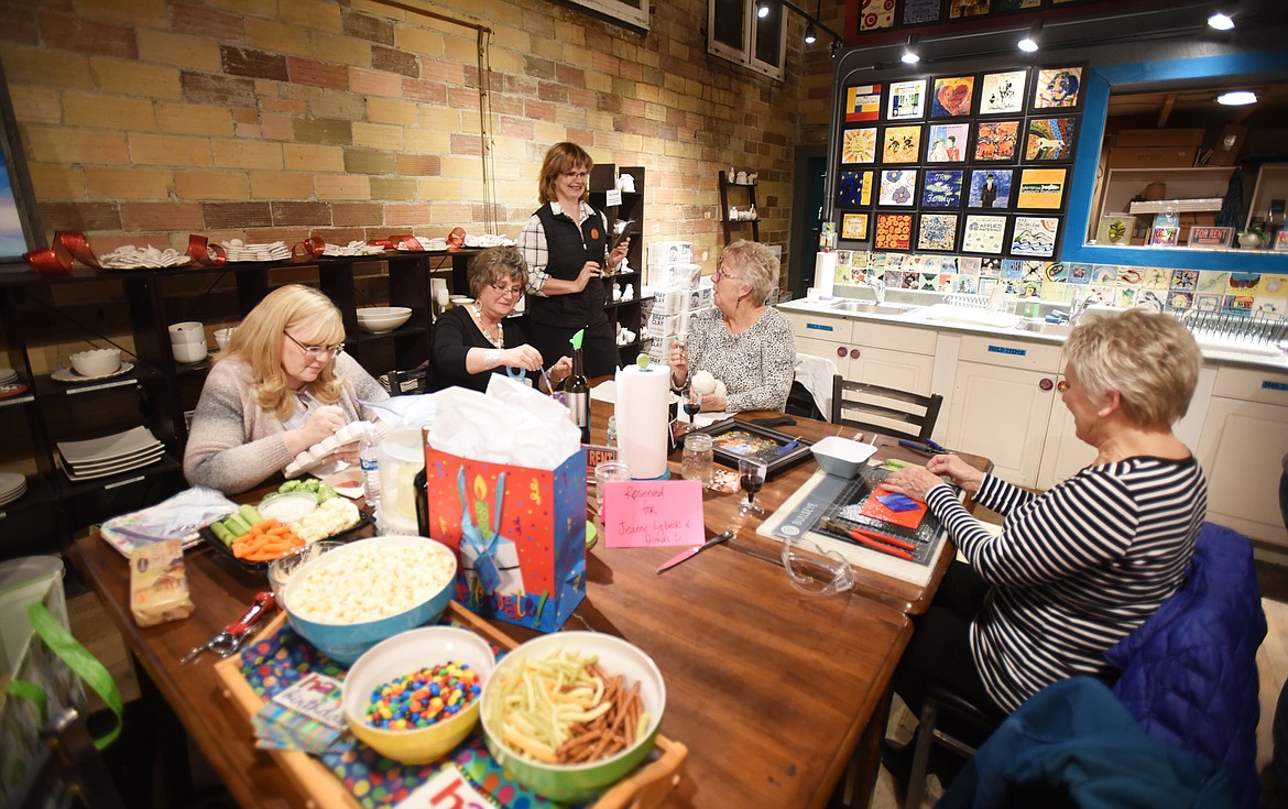 From left, Kelly Wood, Pam Ellis, Joanne Lybeck, Sharrell Perry and Fafa Heitert at the Wild Women Wednesday event at the Stumptown Art Studio on Nov. 15. (Brenda Ahearn/This Week in the Flathead)